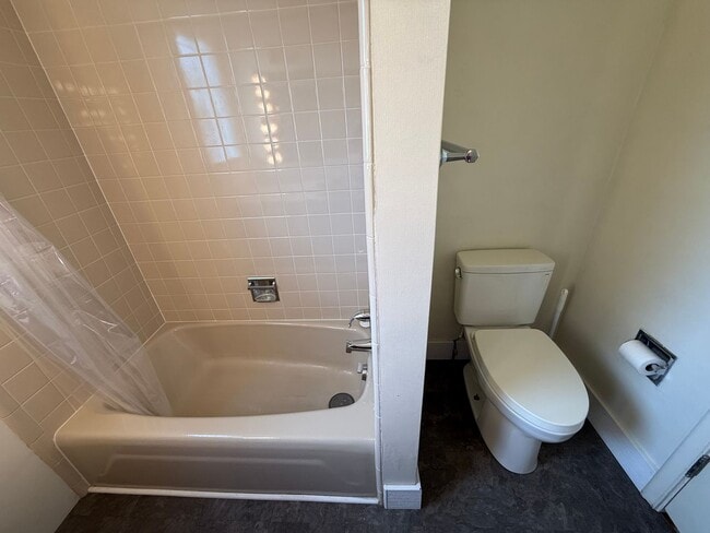 Building Photo - Three Bedroom, One and half bathroom, Atta...