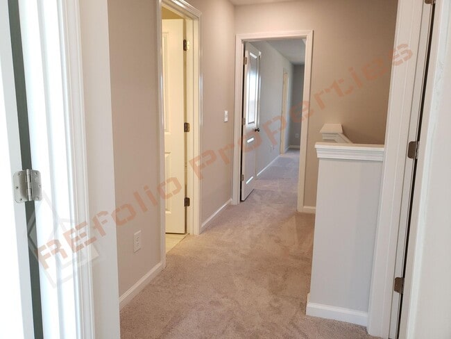 Building Photo - Brand New 3 BR 1-Car Garage Townhome in Do...