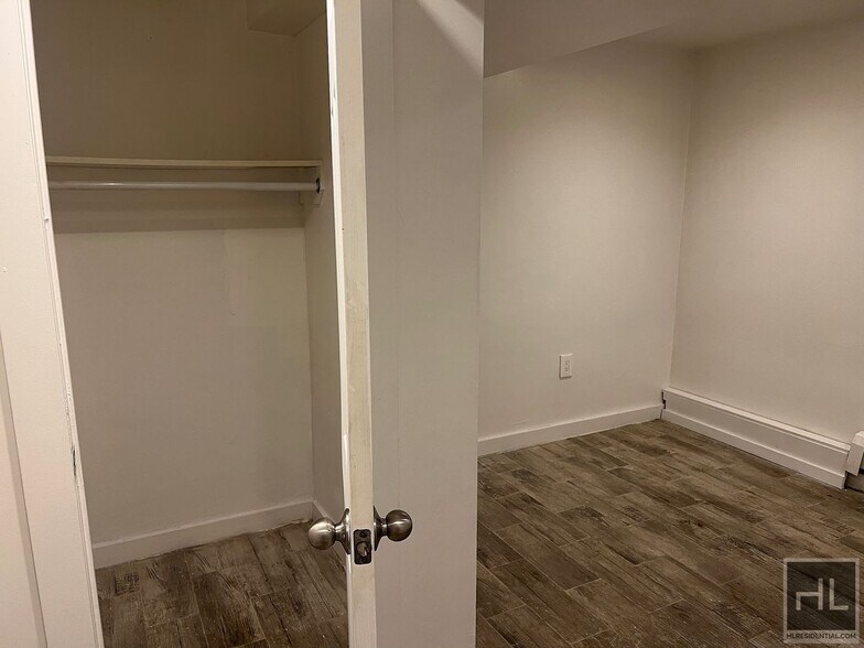 Building Photo - 2BR 1BA Lower Level All Utilities Included w/ Laundry Beside Highland Park
