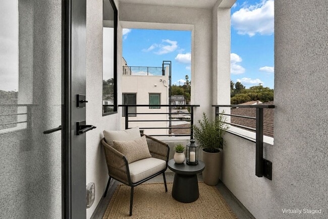 Building Photo - Modern 4-Bed with Rooftop Balcony & Dual Primary Suites