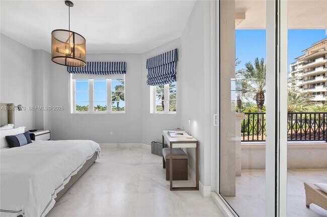 Building Photo - 7133 Fisher Island Dr