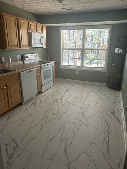 Kitchen-newly renovated floor - 70 Trelawney Dr