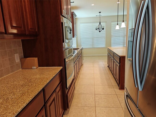 Building Photo - 5551 Twin Rivers Ln