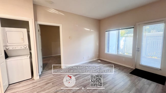 Building Photo - Beautiful 1-bedroom condo nestled in gated...