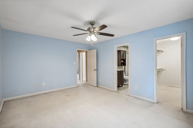 Building Photo - Modern Brick End-Unit Townhome with Stunning Upgrades and Serene Wooded Views