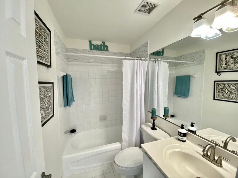 Updated Hall Bath - 810 Revelstore Ter NE
