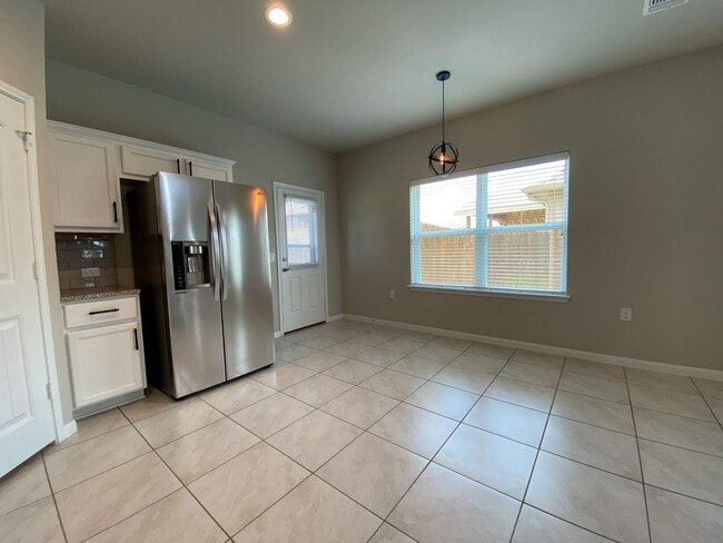 Building Photo - Stylish Southeast Austin Two-Story with Open Living, Modern Kitchen, and Flexible Spaces