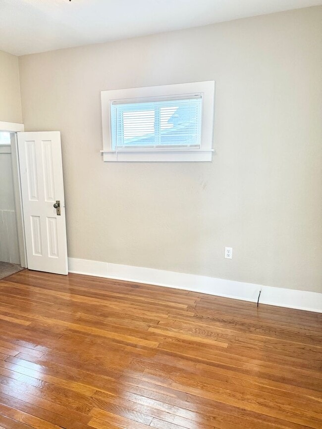 Building Photo - Updated 3-Bedroom Home on Tree-Lined Street with Off-Street Parking