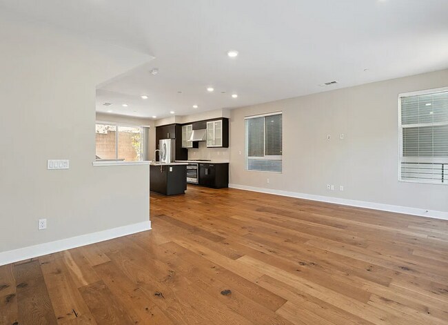 Building Photo - Tucked within the Hollywood Hills in a gated community
