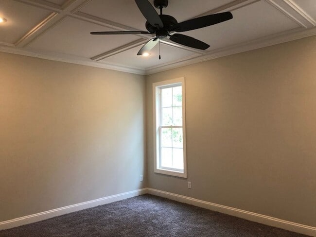 Building Photo - Spacious 4BR/3BA Creekside West Home with Screened Porch, Fenced Yard & 3-Car Garage