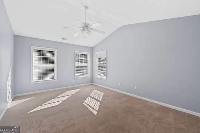 Building Photo - 4674 Creekside Villas Way