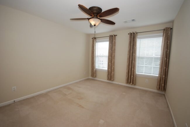 Building Photo - Oversized Executive Style Home with Finish...