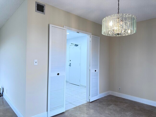 Building Photo - 10777 W Sample Rd