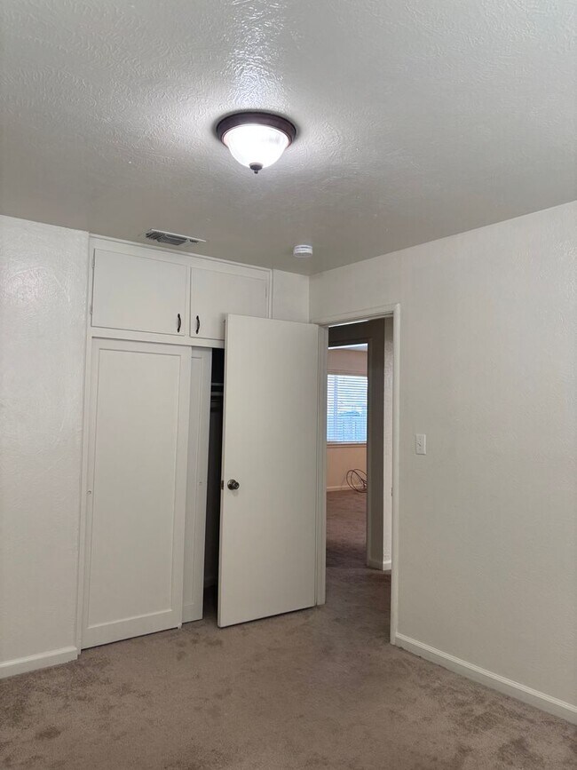 Building Photo - Updated 3 bedroom 2 bathroom home with large backyard, corner lot, close to shopping and schools ...