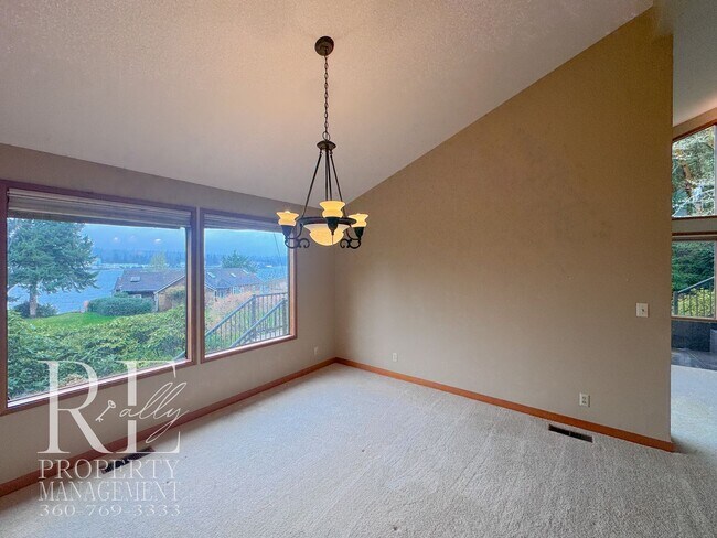 Building Photo - Vaulted 2-Bed Home with Scenic Views, Gas Fireplace & Oversized Deck
