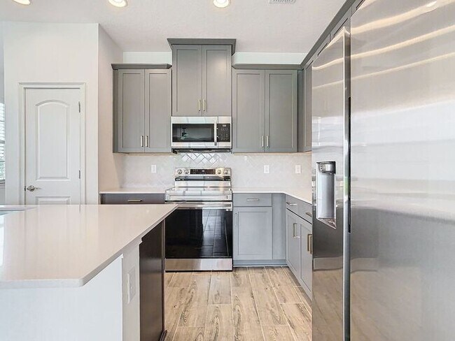 Building Photo - Gorgeous 3/2 Modern Home with a 2 Car Gara...