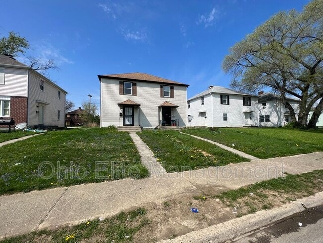 Building Photo - 1310 E 25th Ave