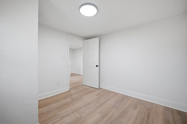 Building Photo - NEWLY REMODELED 4 BEDROOM COLONIAL HOME FOR RENT IN SUFFOLK!