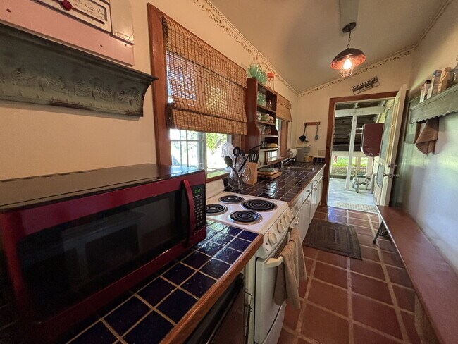 Building Photo - Unique fully furnished 1-2 bedroom property secluded on Newtown Road ten minutes from Placerville!