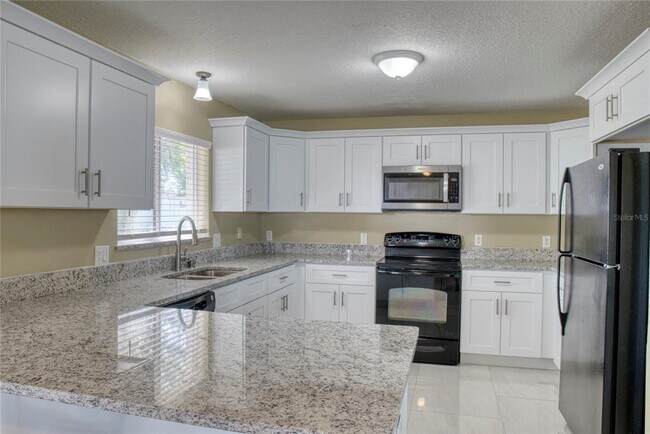 Building Photo - 7316 Hunters Greene Cir