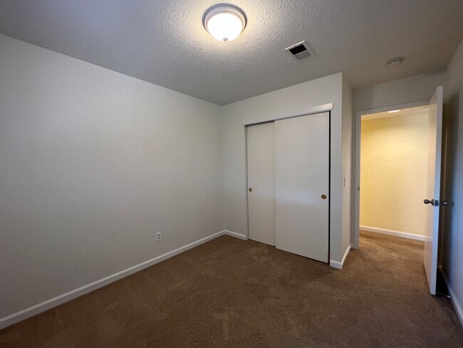 Building Photo - Spacious 1,196 Square Foot  4BR Home Across from Technology High School | Large Yard & 2-Car Garage"