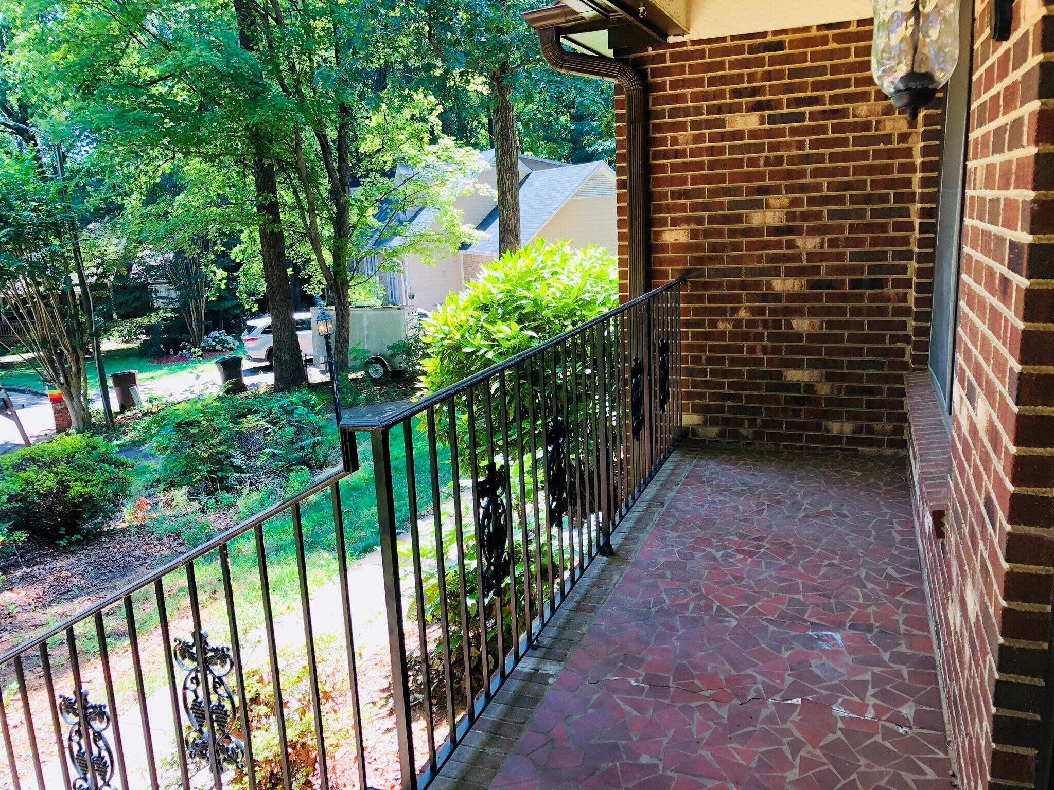 The front porch makes for a great spot to read and sip some sweet tea on this quiet and peaceful cul de sac - virtually no traffic! - 3 Tyrol Ct