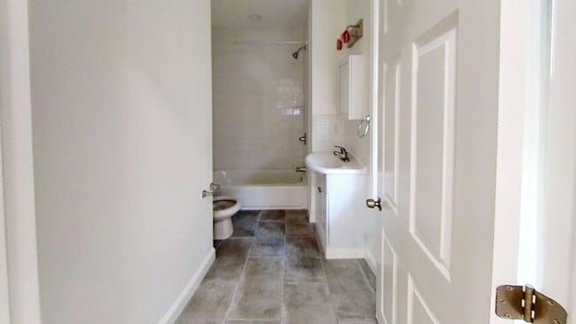 Building Photo - 230E 2nd, Media