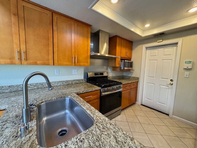 Building Photo - Beautiful updated 2 Story condo in Main Chance Estates w/attached 2 car garage!
