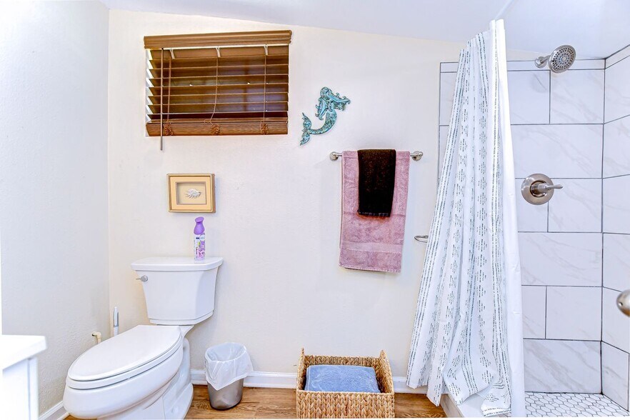 The large bathroom features a large walk in shower - 5114 33rd St E