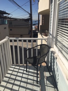 Upper unit balcony with peakaboo ocean view - 123 El Porto St