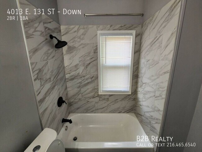 Building Photo - 4013 E. 131 ST-Down