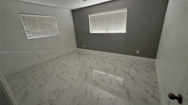 Building Photo - 6365 Miami Lakeway S