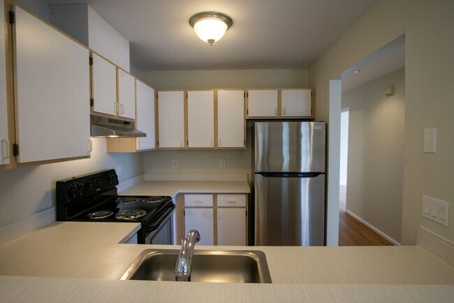 Building Photo - Major Updates: Vaulted Ceiling Spacious 2-Bed 2-Bath w DW, WD, Balcony!