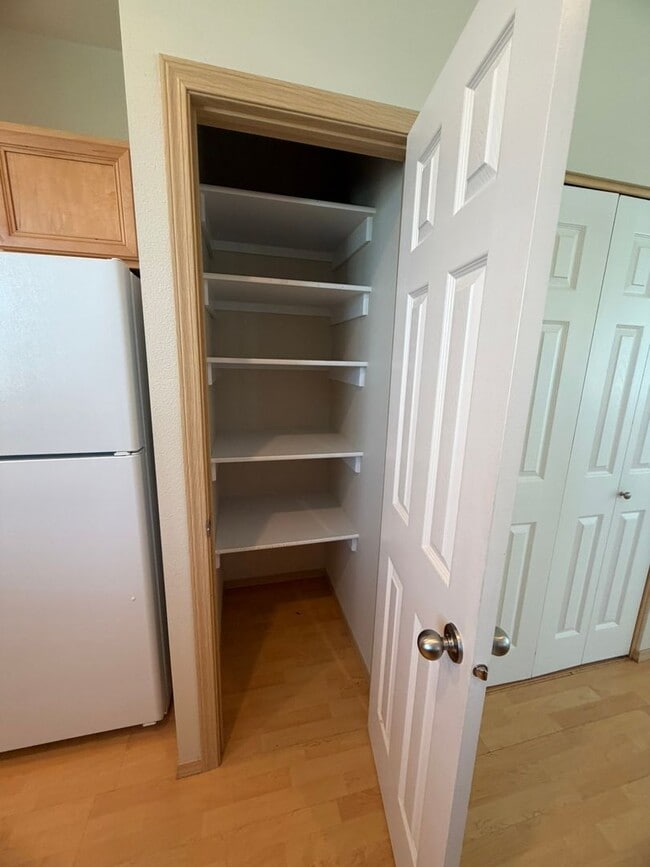 Building Photo - Charming 2-Story Townhome with Vaulted Ceilings