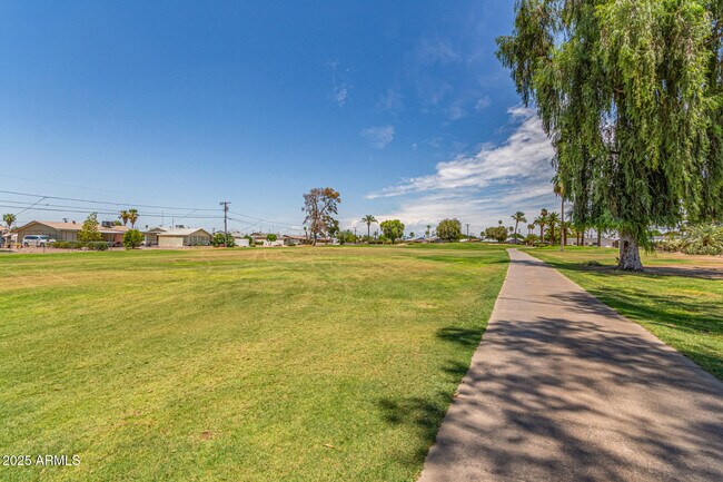 Building Photo - 12640 N Pebble Beach Dr