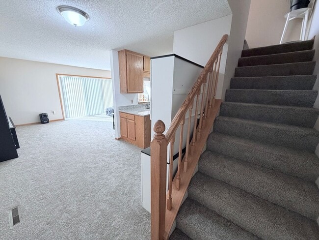 Building Photo - Spacious 2-Bedroom, 2.5 Bathroom, Tri-Level Townhome & Private Deck in Apple Valley!