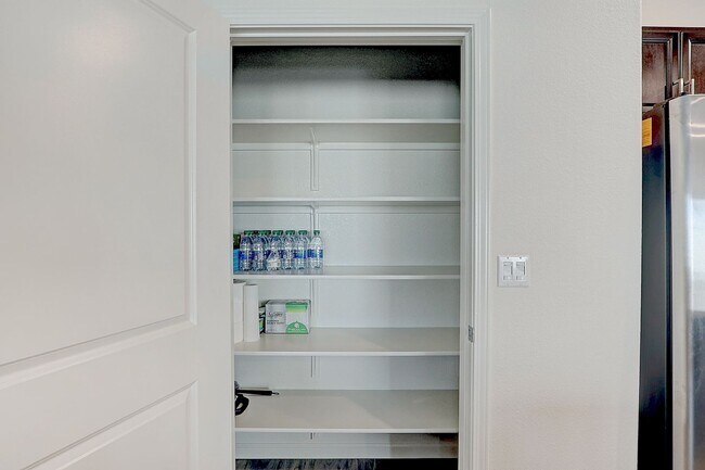 Building Photo - ALMOST NEW FULLY FURNISHED 4 BEDROOM, 2.5 BATHS, CONTEMPORARY FURNITURE AND FINISHES,