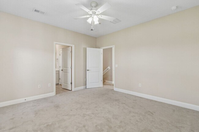 Building Photo - Coastal Luxury Townhome in Gated Amelia Island Community with Elevator & Garage