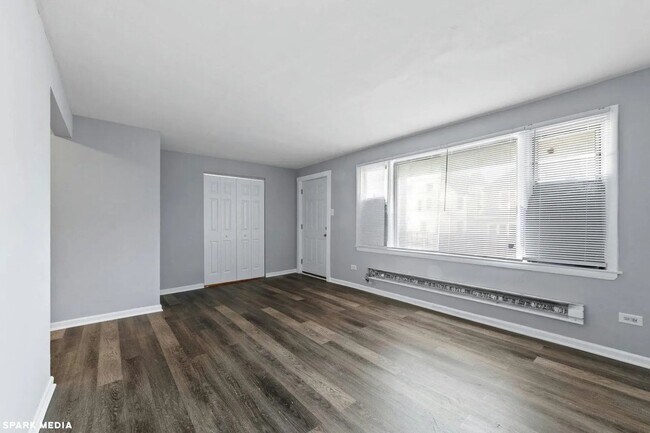 Building Photo - 7617 S Colfax Ave