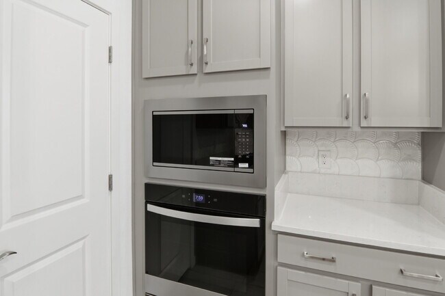 Building Photo - Experience refined living in this beautifully appointed 3-bedroom, 2.5-bathroom townhome spanning...