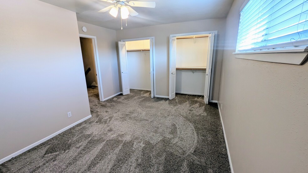 Secondary bedroom has two walk-in closets! - 813 Clubside Dr