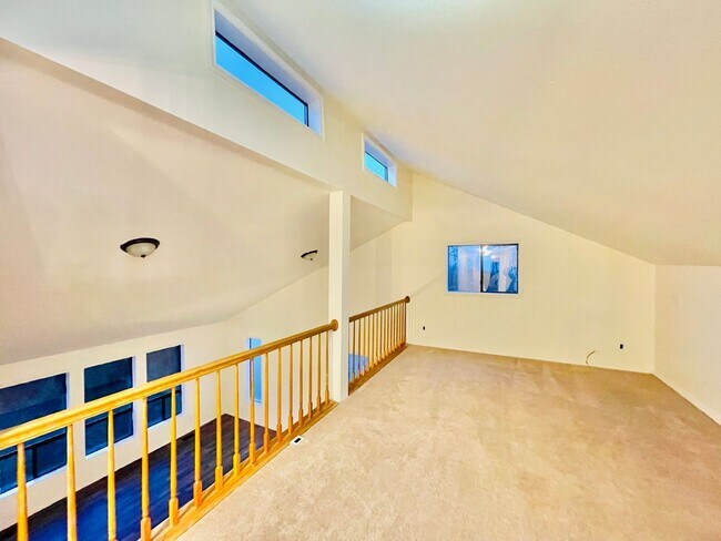 Building Photo - Luxurious 4-Bedroom Retreat with Mount Rai...