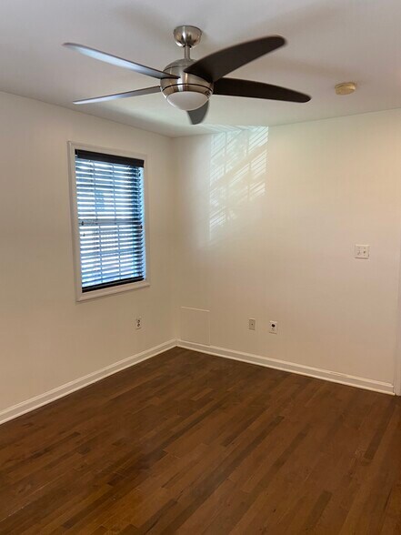 Bedroom with two large windows - 2576 Sherman Ave NW
