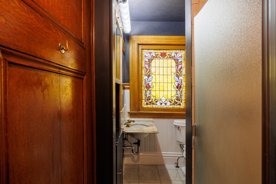 BEAUTIFUL STAINED GLASS IN FRONT BATHROOM - 2398 Broadway