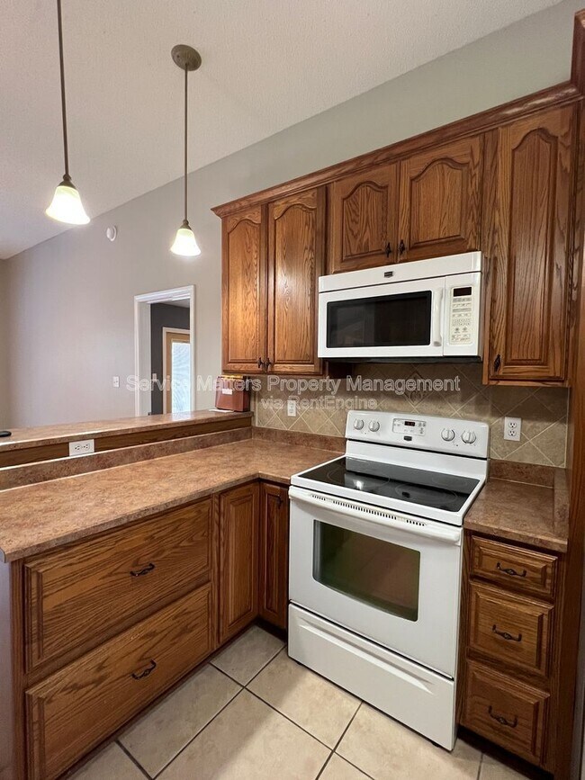 Building Photo - 5784 Twisted Oak Ct