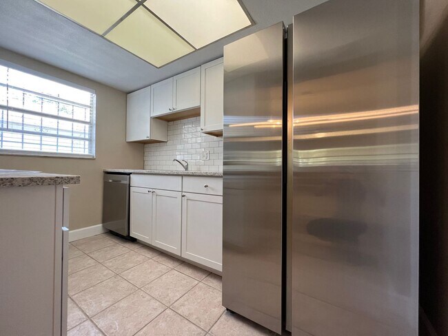 Building Photo - Newly Renovated 3/2 Home ~ Brand New Kitchen ~ Updated Bathrooms ~ Fenced Yard!