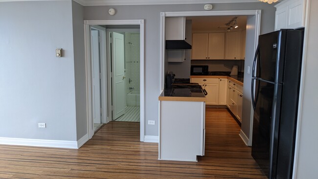 Living room view of Kitchen and hall to bath and 2nd bedroom - 20 Chestnut St