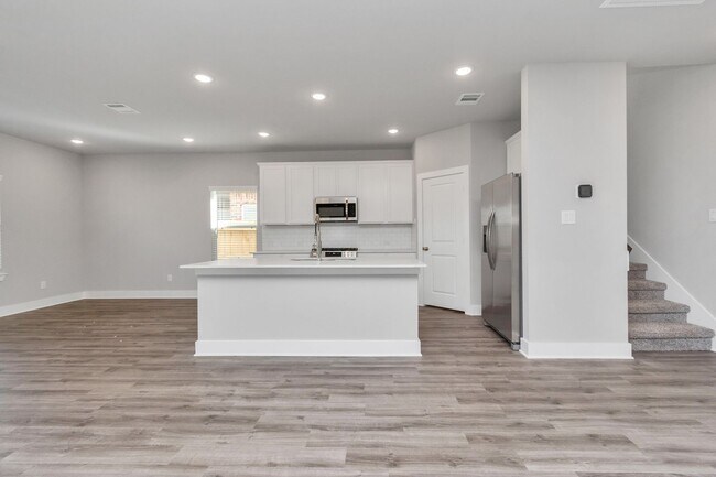 Building Photo - Welcome to the Holly — Spacious Comfort, Modern Style.