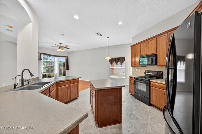 Building Photo - 13175 Tom Morris Dr