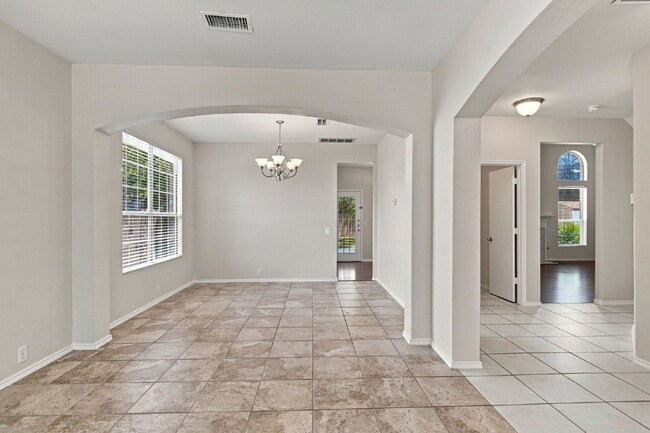 Building Photo - "Spacious Two-Story Home with Multiple Living Spaces and and Expansive Backyard!"